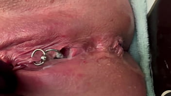 Pee very strong stream from my pierced pussy and my hands in latex glove Pee very strong stream from my pierced pussy and my hands in latex glove