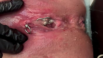Pee very strong stream from my pierced pussy and my hands in latex glove