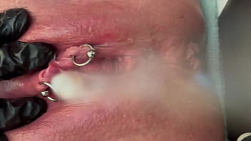 Pee very strong stream from my pierced pussy and my hands in latex glove