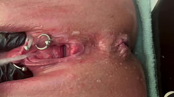 Pee very strong stream from my pierced pussy and my hands in latex glove