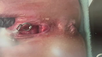 Pee very strong stream from my pierced pussy and my hands in latex glove