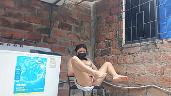 My slutty neighbor in the yard showing her pussy under her dress