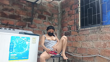 My slutty neighbor in the yard showing her pussy under her dress