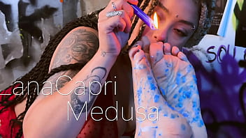 Dripping hot candle wax on my soles and toes