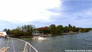 Cute redhead stroking and sucking her rescuers hard cock