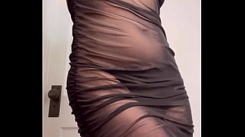 Redhead shaking ass in see through dress