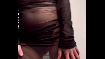 Redhead shaking ass in see through dress