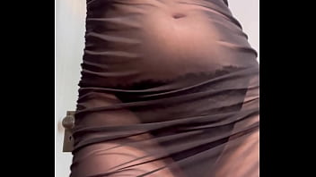 Redhead shaking ass in see through dress