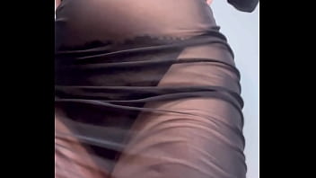 Redhead shaking ass in see through dress