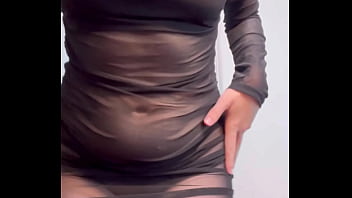 Redhead shaking ass in see through dress