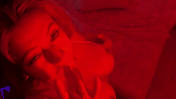 Latina milf under red light sucks balls spits on dick handjob and huge facial cumshot