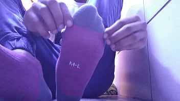 Showing My Size 10 Feet In Orange Socks thumbnail