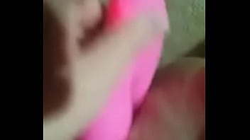 Blonde girl uses a dildo