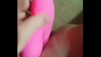 Blonde girl uses a dildo