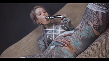 Tattoo girl gets a stainless steel dildo to shove up her ass