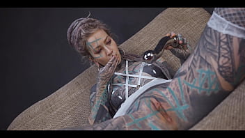 Tattoo girl gets a stainless steel dildo to shove up her ass