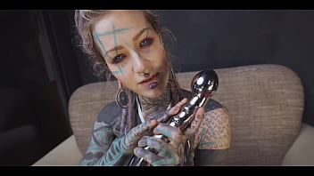 Tattoo girl gets a stainless steel dildo to shove up her ass