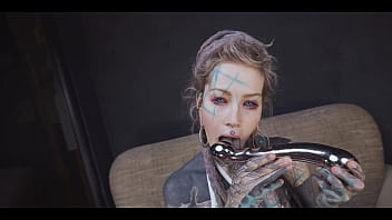 Tattoo girl gets a stainless steel dildo to shove up her ass