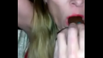 Jasmine masturbating with a candybar