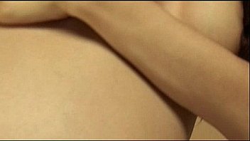 Skinny pregnant girl posing in leopard bikini