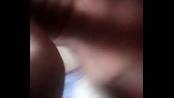 Black girl touching her boobs