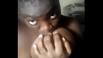 Black girl touching her boobs