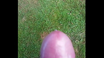 Cumming in the grass