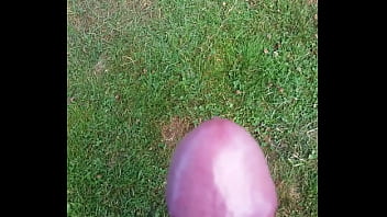 Cumming in the grass