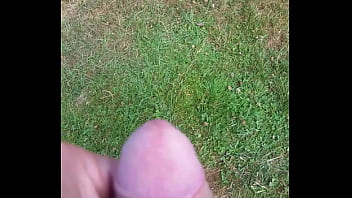 Cumming in the grass