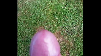 Cumming in the grass