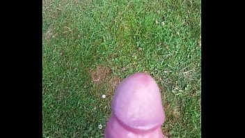 Cumming in the grass