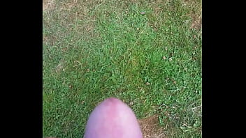 Cumming in the grass