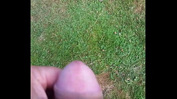 Cumming in the grass