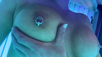 Masturbate and nipples play in sunbathing area studio