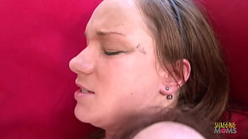 Dark skinned dude fucking a brunette girl's ass on the couch