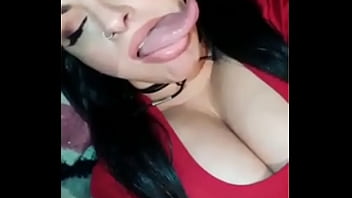 Latina babe shows off her tongue Latina babe shows off her tongue