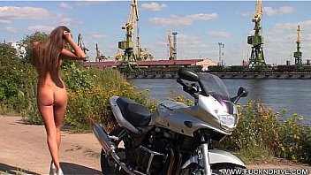 Horny stunner on a hot bike