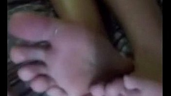 Cute latina teasing her feet and soles