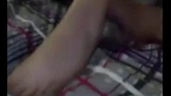 Cute latina teasing her feet and soles