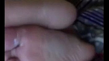 Cute latina teasing her feet and soles