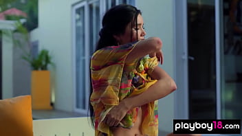 Nude brunette muse spreading her legs and introducing her perfect pussy