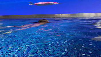 Monika fox in purple bikini swims in pool & poses by window against background of city free