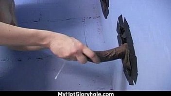 Ebony hottie milking cocks in the gloryhole 2