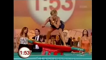 Another hot lady takes part in the indoor surfing game on buono domenica which inevitibly leads to upskirts and downblouse moments
