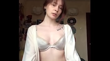 Passionately masturbating pussy with a dildo