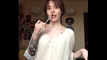 Passionately masturbating pussy with a dildo