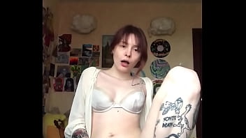 Passionately masturbating pussy with a dildo