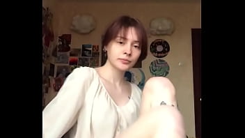 Passionately masturbating pussy with a dildo