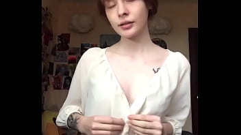 Passionately masturbating pussy with a dildo