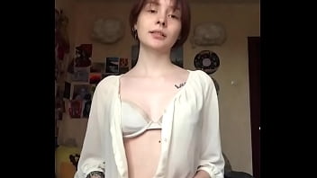 Passionately masturbating pussy with a dildo